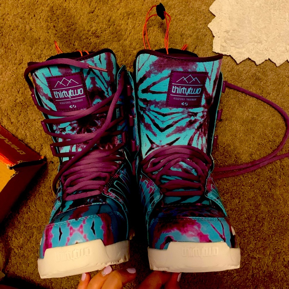 Thirty two snowboard boots. Brand new, never been worn. Too small for me…
